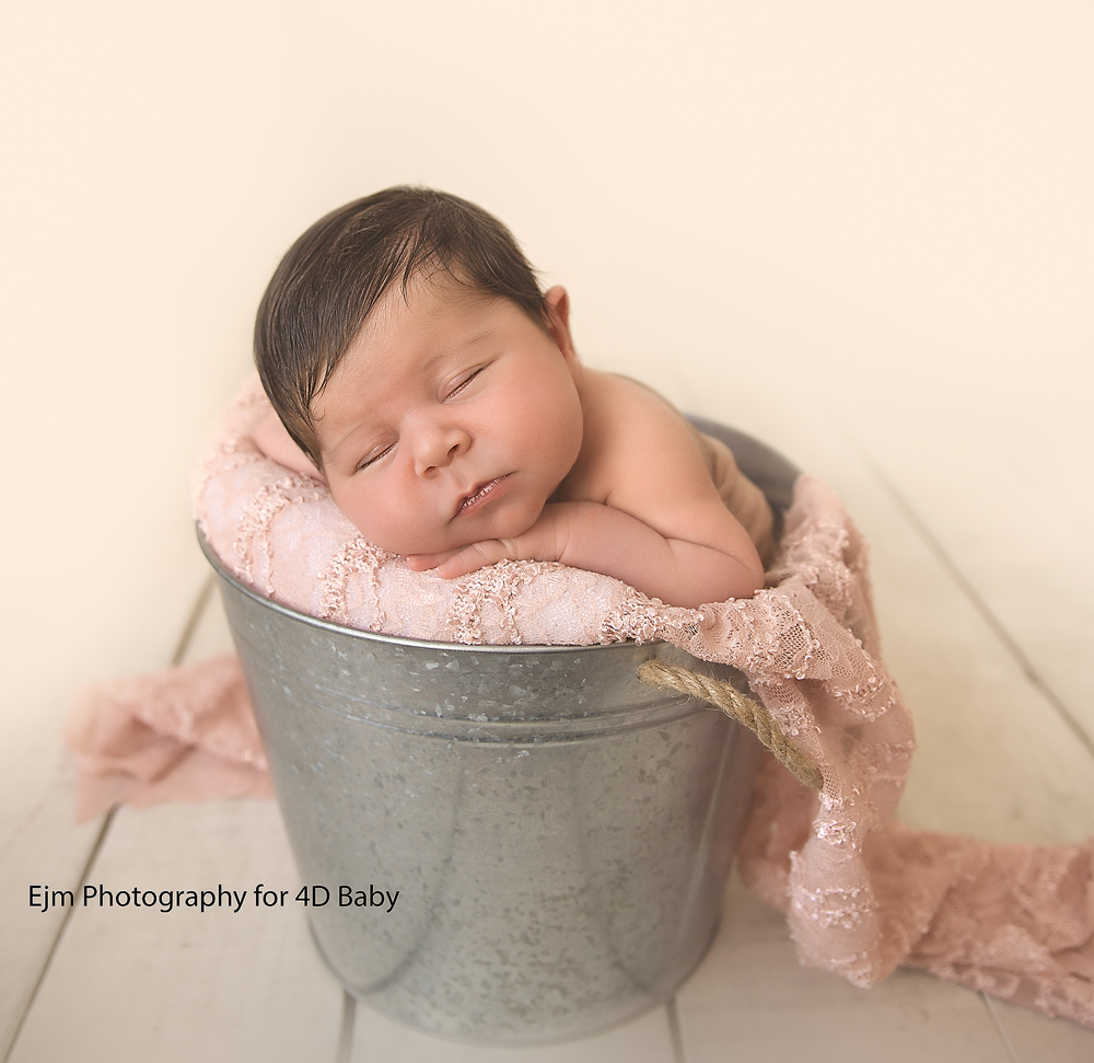 Newborn in bucket