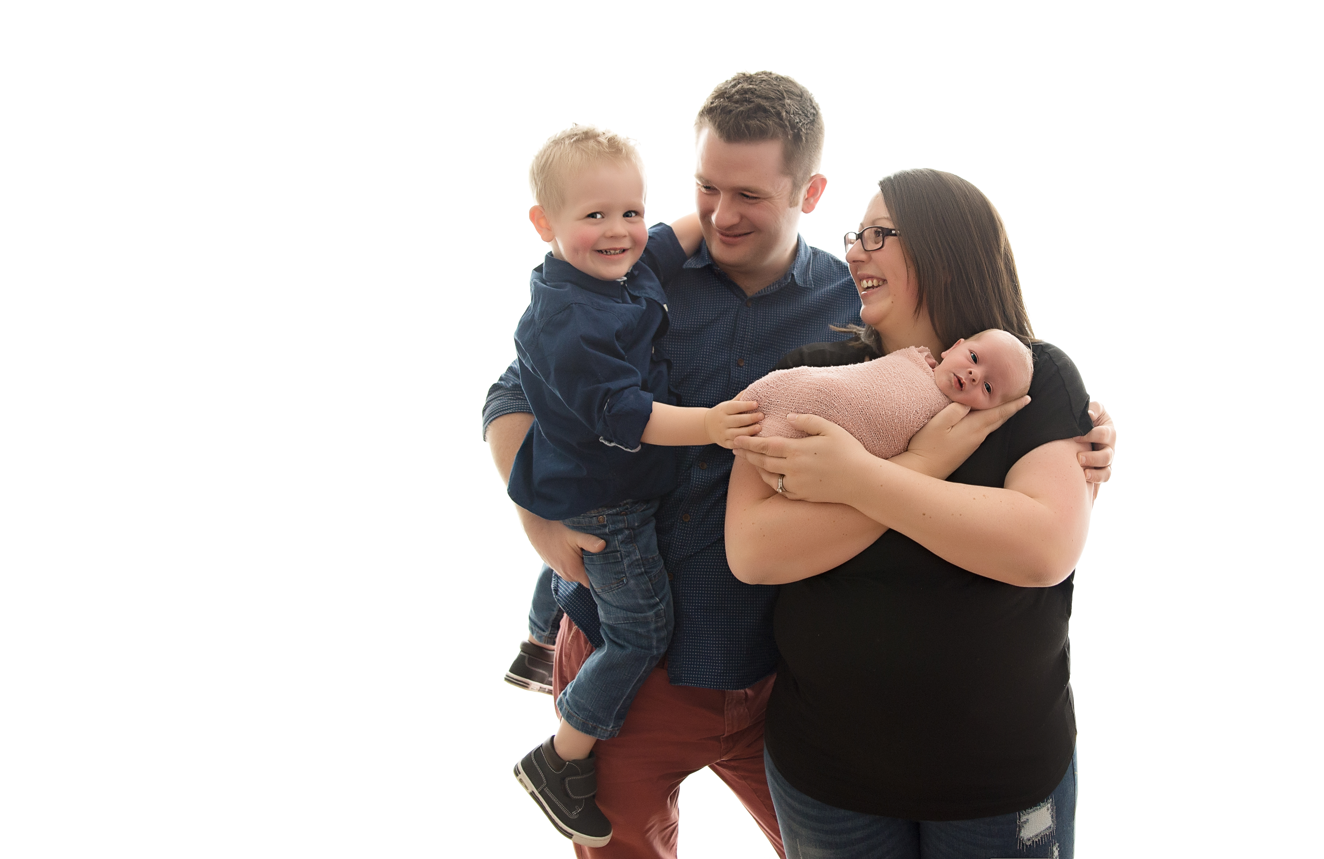 Mum, Dad, brother with new baby 