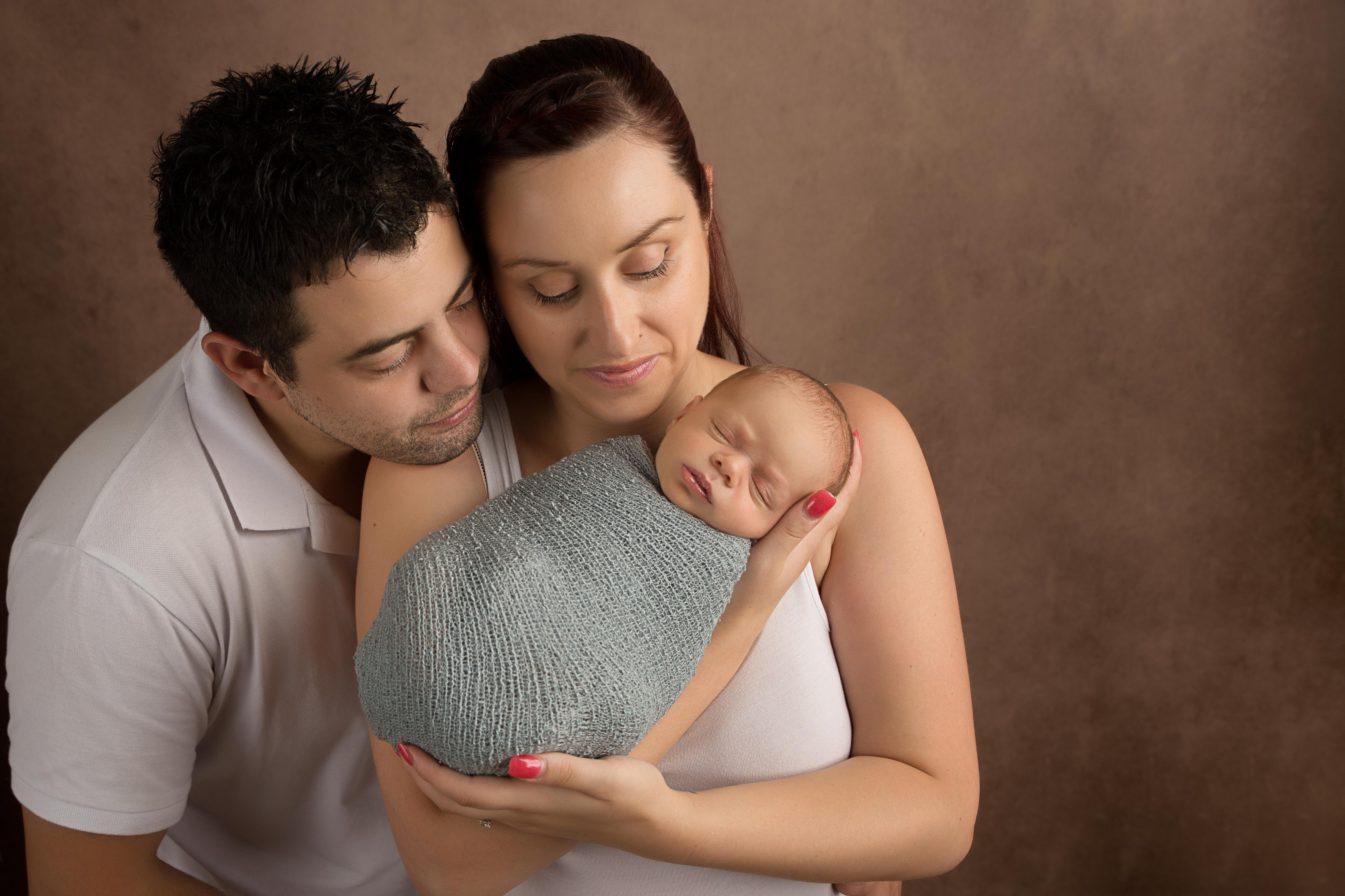 Mum, Dad and newborn baby photo