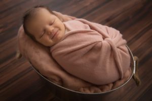 Newborn smile for newborn photography. 