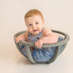 cute boy in basket