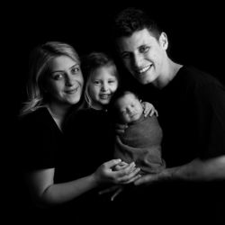 Black and white family photo taken during Newborn photographer Melbourne photo shoot